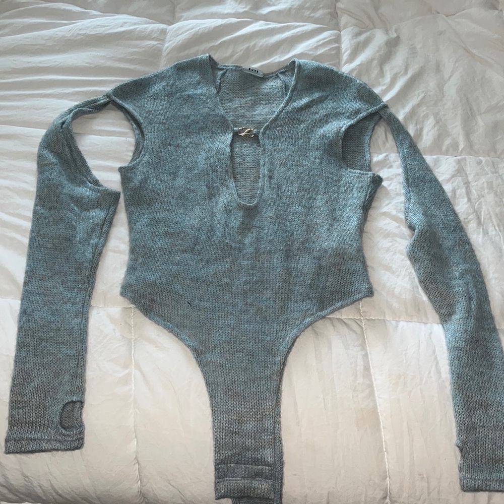 This is a cutout bodysuit that’s never been worn